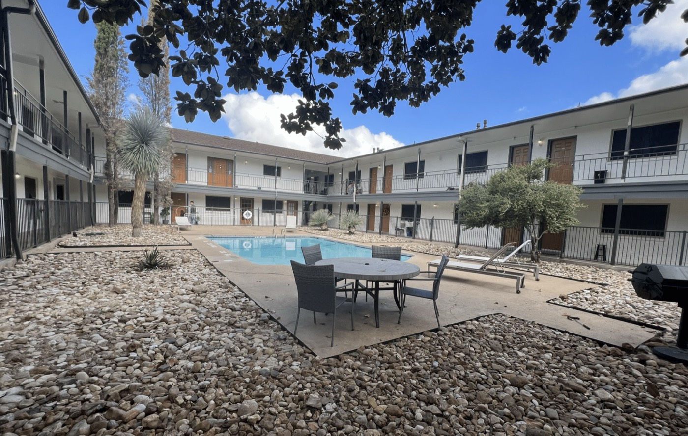 Pool courtyard with patio seating